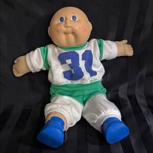 Doll with Green and Blue Outfit